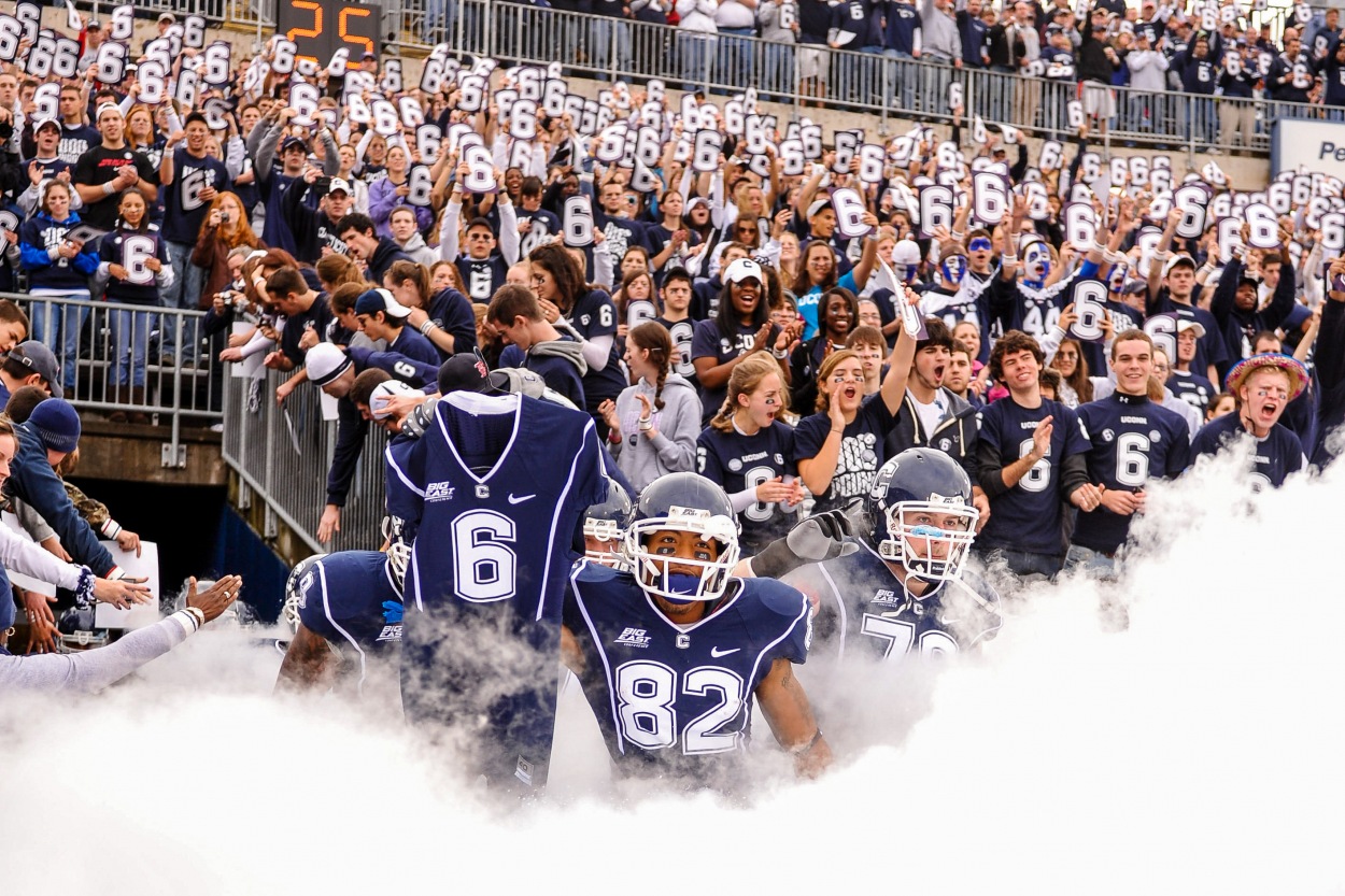 Sports_1001.jpg Sports Photography big east,cs,clarus studios,clarus studios inc,connecticut,division,football,huskies,jasper howard,kashif moore,ncaa,one,rentschler field,rutgers,scarlet knights,sports,uconn,university,university of connecticut,action,action photography,conference,homepag