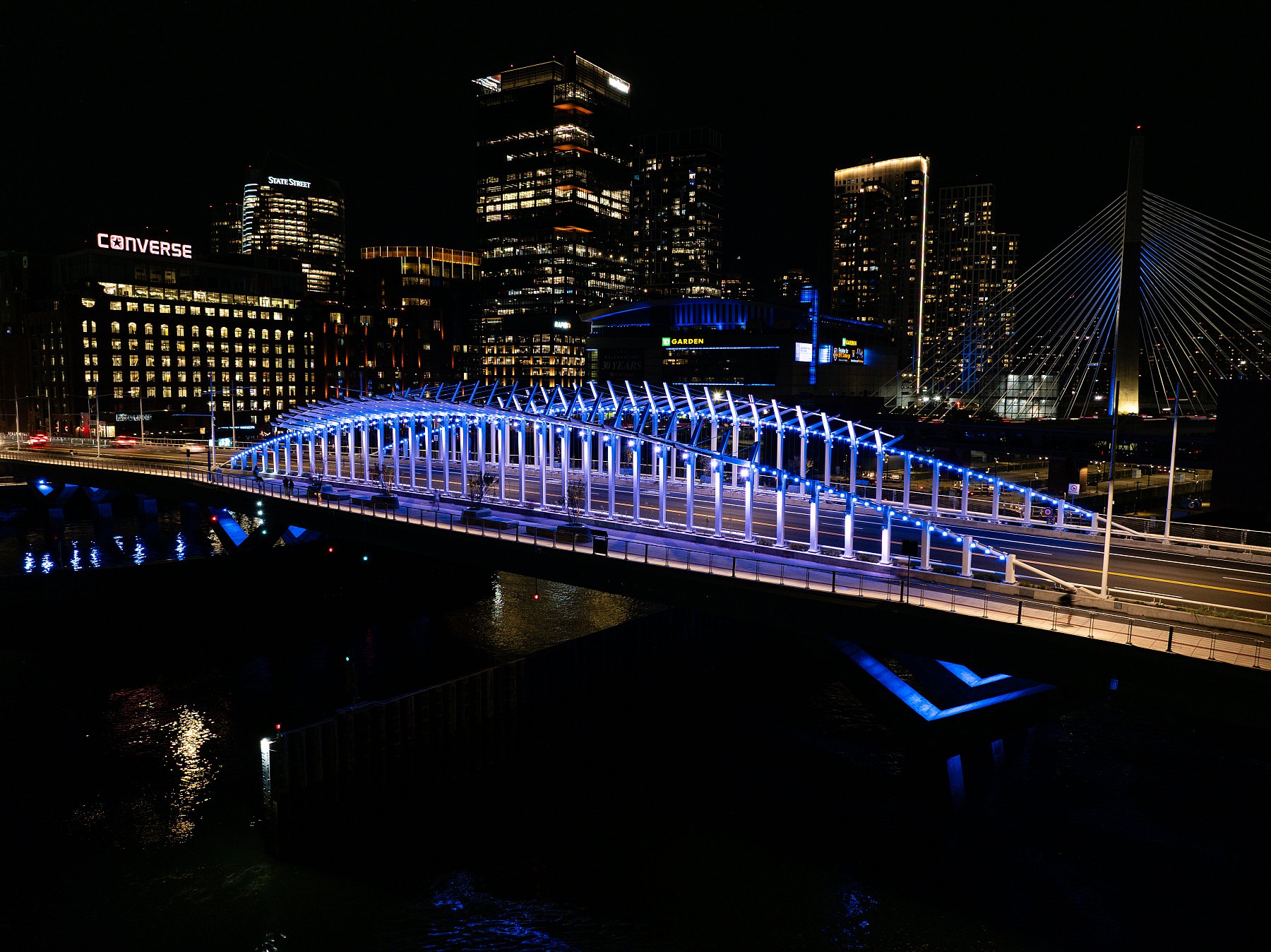 William Felton “Bill” Russell Bridge aerial night photo - overlooking the Boston Skyline from the harbor